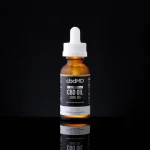 CBDMD CBD Tincture - Full Spectrum 3000mg bottle with white topper on a black background.