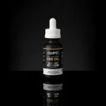 CBD Tincture - Full Spectrum 6000mg in a brown bottle set on a black background